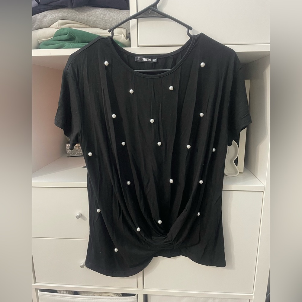 soft black tee with pearl accents